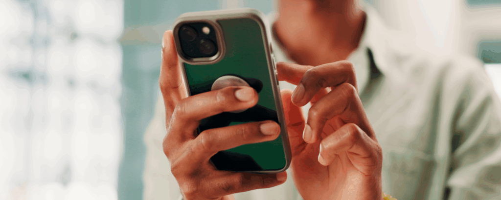 Image of a person holding a phone